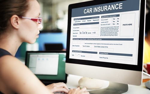 Woman getting car insurance online