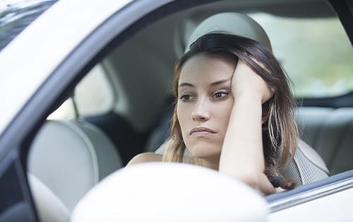 woman-sad-car