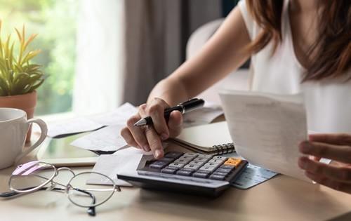 woman-calculator-desk