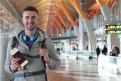 Man with airplane tickets