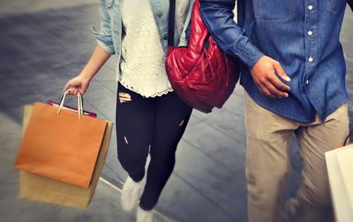 holiday-spending-shopping-bags-man-woman1.jpg