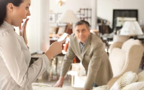 furniture-store-surprised-woman-salesman.jpg