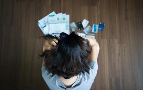 woman-credit-card-bills.jpg