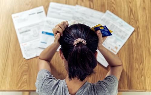 woman-frustrated-debt-credit-cards.jpg