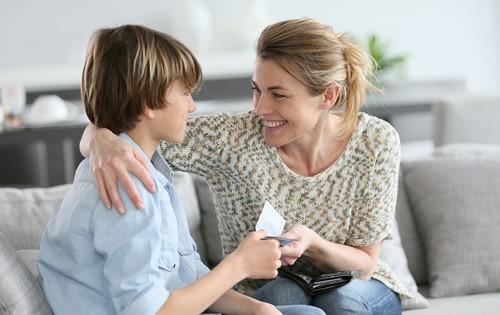 woman-giving-son-money-for-allowance.jpg